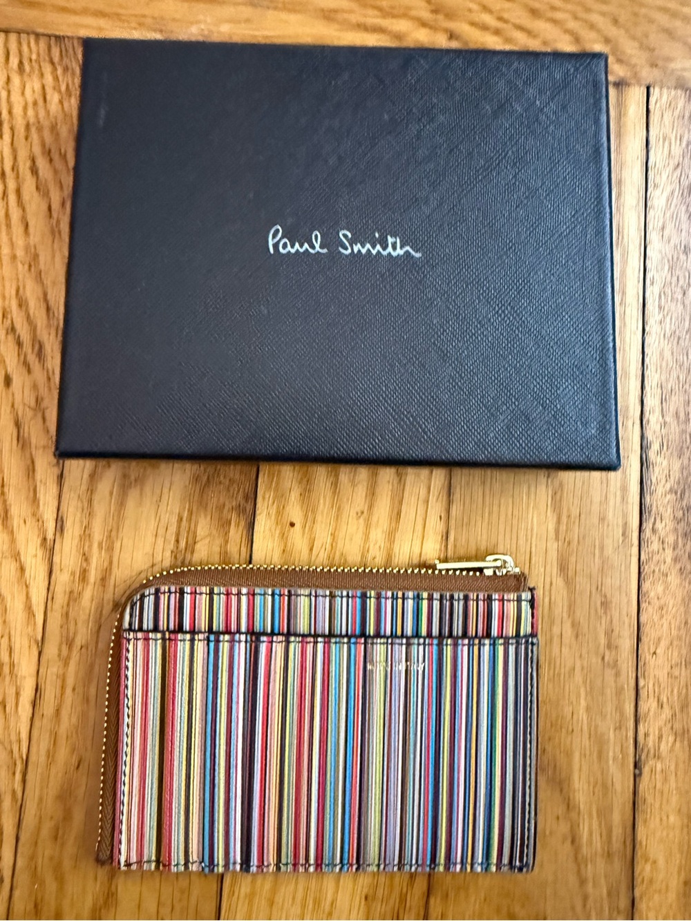 PAUL SMITH
Signature Stripe zip-around leather wallet
